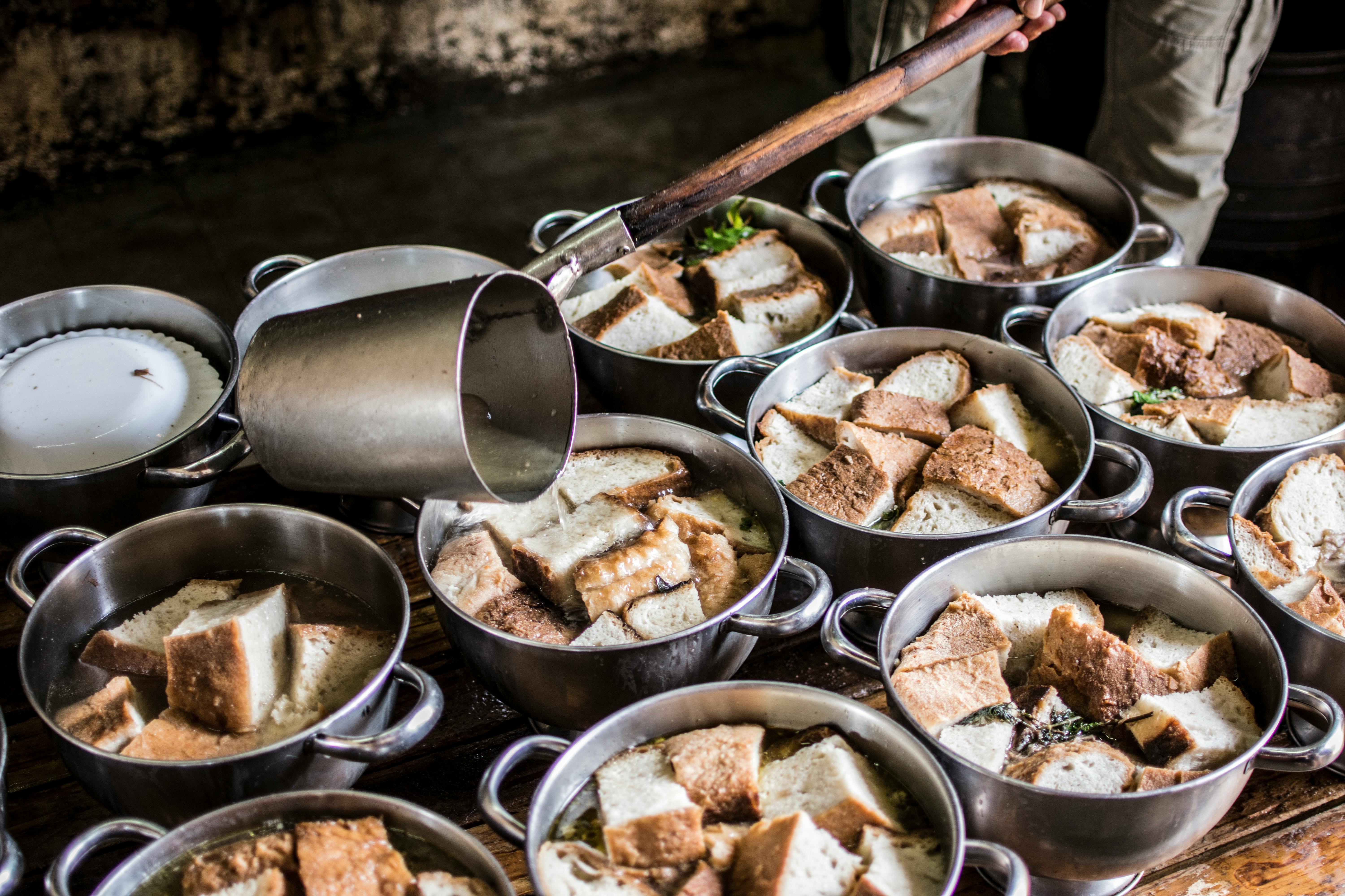 South African small business owner looking concerned about food waste costs and losses